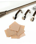 Curtain rod set with brackets and mounting hardware for easy installation.