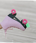 Pink quad skate with light green PU toe stop replacement pair for quad skates with extra stopping power and smooth stop.