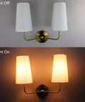 Modern Gold Wall Sconce With Fabric Shade Two Light Brushed Brass Vanity Bath Light For Bedroom Hallway Living Room Decor Wall Mount Ambient Lighting Soft White Linen Shade Go To Everyday Lighting, showing light on and off
