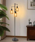 Dimmable 3-Light Oil Rubbed Bronze Farmhouse Floor Lamp With Amber Glass Shades in living room setting