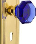 Deco Plate Waldorf Cobalt Door Knob Set In Unlaquered Brass With Keyhole Passage 2.75 Backset Old School Vintage Vibe For Closet And Hallway