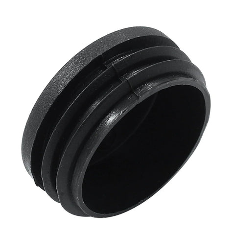 Close-up of black 45mm round plastic hole plug, part of Four Pack One And Three Quarters Inch Round Plastic Hole Plugs Black End Caps.