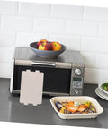 10 Piece Heat Resistant Mica Sheet For Microwave Oven Insulation next to microwave on counter