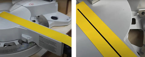 Top Shelf Zero Clearance Tape For Nail The Cut Precision And Crispy Clean Edges On Miter Or Table Saws with yellow PVC on a miter saw.
