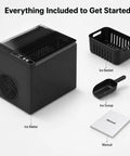 Portable Countertop Ice Maker Slings Nine Swift Bullet Cubes In Six Minutes And Cranks Out Twenty Six Pounds Daily With Silent Running and accessories including ice basket and scoop.