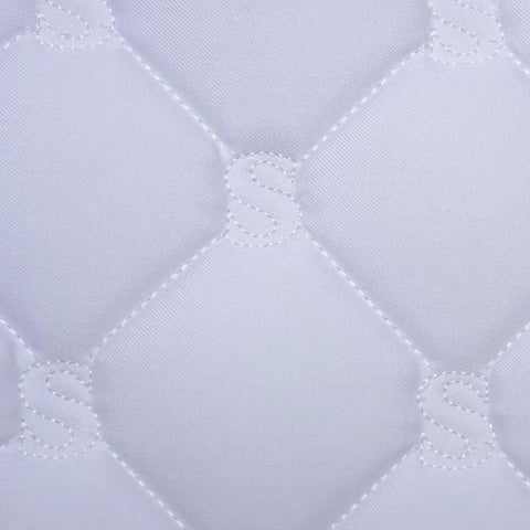 Close-up of quilt pattern on Quilted Contoured Dressage Pad With Braided Trim For Top Notch Horse Comfort And Smooth Arena Performance In White