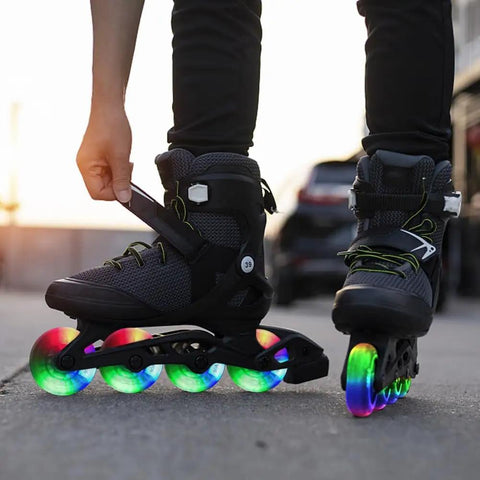 Close-up of inline skates with glowing wheels, outdoors. Focus on Durable Inline Skate Wheels 64mm 24mm Wide With Pre Installed Bearings.