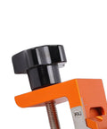 Close-up of the Rock Solid Double Hole Drilling Positioner with black knob, showing precision clamp mechanism for woodworking use.