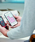 D2 Pro Grade Laser Distance Meter With 100m Range And Bluetooth Four Point Zero Metric And Imperial Modes Flip Out End Piece Pythagorean Functions Sketch Measure For Areas And Volumes Black And Red, held with phone app