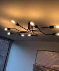 Black Sputnik Ceiling Light Fixture With Eight Adjustable Arms Industrial Semi Flush Mount Chandelier lit in living room