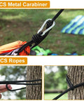 All In One Camping Hammock With Heavy Duty Tree Straps 660 Lb Capacity showing carabiners and ropes tied to tree