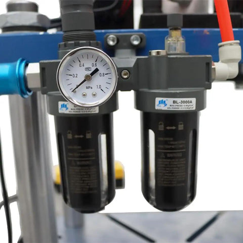 Tough As Nails Pneumatic Punch Press Machine With Crisp Digital Display Controller showing pressure gauge and filters for air supply