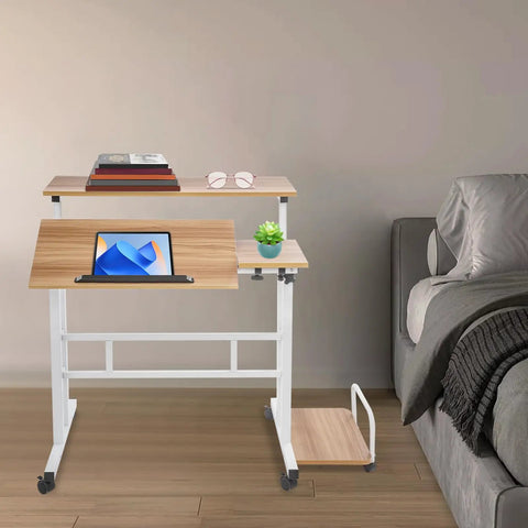 Effortless Folding Standing Desk With Smooth Rolling Casters And Tilted Writing Panels For Total Flex Work From Home Setup Featuring Quick Height Adjustments In Modern Light Walnut And White, with books and laptop.