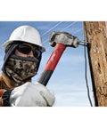Absolute Beast Heavy Duty 4In1 Lineman Hammer 36 Oz Strike Built Different For Electricians And Job Site Pros Tough As Nails With Grippy Handle in use by a contractor on wooden pole.