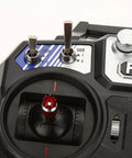 Close-up of controls on Flysky FS i6 AFHDS 2A 2.4GHz 6 Channel Radio Transmitter for RC Helicopter and Glider with FS iA6 Receiver Mode 2