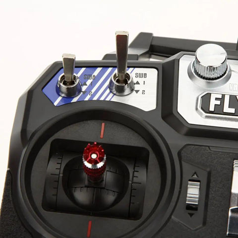 Close-up of controls on Flysky FS i6 AFHDS 2A 2.4GHz 6 Channel Radio Transmitter for RC Helicopter and Glider with FS iA6 Receiver Mode 2