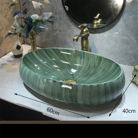 USZWBY Green Ceramic Oval Vessel Sink for Bathroom Balcony Outdoor Counter Top Vanity, 60cm x 40cm, elegant design on countertop.