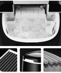 Solid Countertop Electric Ice Maker Game Changer That Cranks Out Chewy Bullet Cubes In Six Minutes With Easy Size Swaps Yields 25 Lbs Daily Smooth Operation Great For Patio Parties And Chill showing ice storage compartment filled with bullet ice cubes.