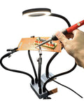 LED Magnifying Glass Table Lamp With Adjustable Brightness And Color Temperature For DIY Pro Grade Crafts Jewelry Making Welding Repair And Reading Hands Free Workbench Magnifier Light in use with soldering iron on circuit board