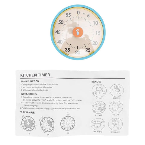 Dual Mode 60 Minute Mechanical Kitchen Timer With Magnetic Back And Built In Stand next to instruction manual.