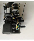 12V Diesel Truck Parking Heater With Water Cooling System showing top view with hoses, wiring and black casing for cab warmth.