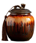 Solid Glazed Ceramic Tea Canister With Airtight Ruyi Lid For Stashing Premium Ground Coffee Beans Spice Rubs And Salt In Vintage Chinese Jars with a glossy finish and tassel detail