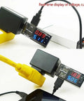 USB Power Meter And Current Tester With LCD Display 3-9V 0-5A Voltage Tester Multimeter in use showing voltage and current.