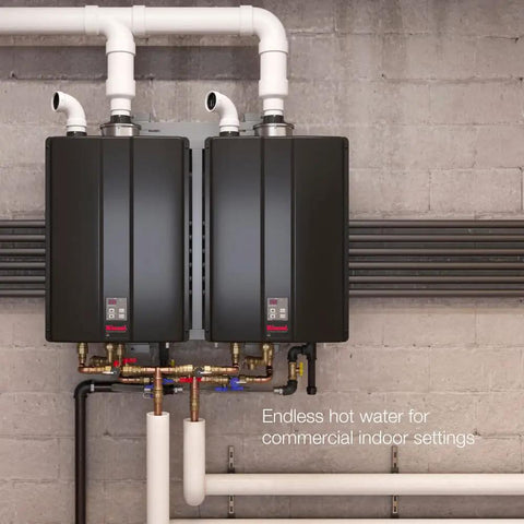 Built Heavy Duty Commercial Propane Tankless Water Heater Runs Straight Up Smooth With Powerful Condensing System Delivers Nine Gallons Per Minute Of Blazing Hot Water Perfect For Indoor Jobs And Non Stop Workflow. Two units installed with pipes and fittings.