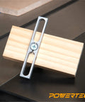 Miter Slot Hardware Kit With Aluminum Slot Bars on wood showing jig use for DIY hold downs.