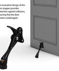 Kickdown Door Stopper With Zinc Alloy Build Low Profile Door Holder showing installation on a gray door, preventing scratches.