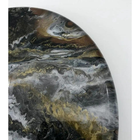 Close-up of Dope Geode Lazy Susan 15 Inch Serving Tray with black and gold accent, resin geode pattern, modern home decor.