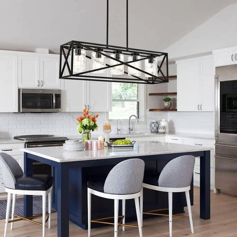 Kitchen with Boss Level Farmhouse Linear Chandelier with textured seedy glass shades, matte black finish, above island.