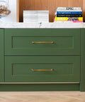 Antique Brass Cabinet Pulls on green kitchen drawers, 7 9/16 inch, zinc alloy, vintage farmhouse with tiered rosettes design.
