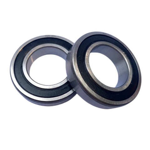 R20-2RS 1-1/4X2-1/4X1/2 Ball Bearing Chrome Steel Double Sealed C3 showing dual bearings from an angle on a white background.