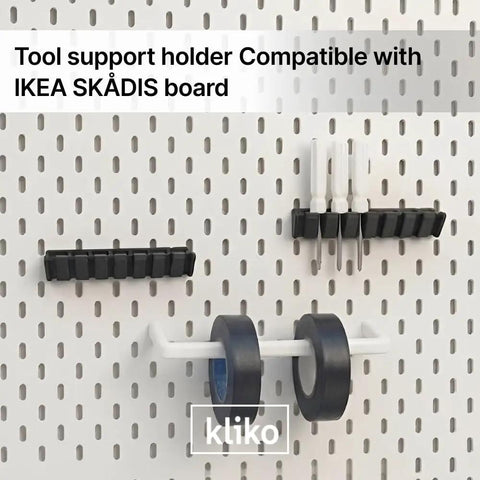 Skådis Tape And Tool Holder Pegboard Organizer for tape rolls and accessories on black wall mount hanger