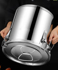 Solid 304 Stainless Steel Food Storage Canisters With No Sweat Snap Lids, Massive Airtight bulk holding container being lifted.
