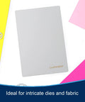 6x9 Inch Metal Cutting Plate For Die Cutting Accessories, 304 Stainless Steel, Thin Yet Tough, Pro Grade Cutting Power For Intricate Dies, Durable Silver Plate, 1 Pack shown with colorful paper.