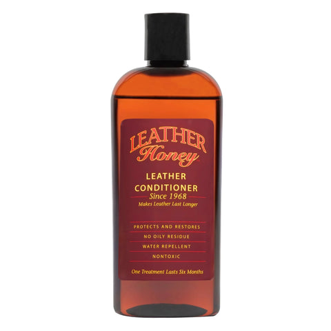 Leather Honey Leather Conditioner bottle, amber plastic container with black cap, front view