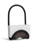 Flexible Sling Sponge Holder for Kitchen Sink No Suction Cups Non Slip Caddy in modern black with perforated base holding a sponge.