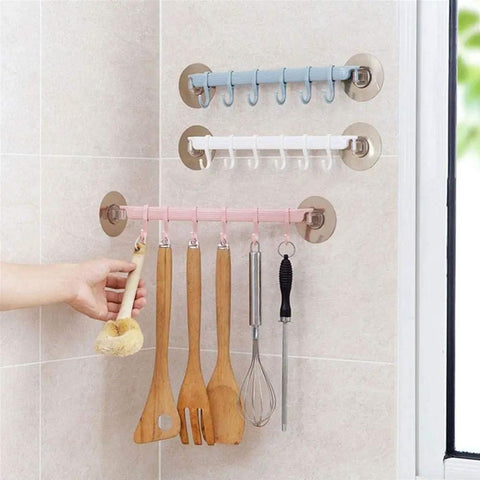 No Drill Hassle Self Adhesive Towel Rack Wall Mount Hook With Hella Strong Grip For Bathroom Kitchen And Living Room Totally Rad Space Saving Storage Solution Smooth Finish with hanging tools in pastel colors.