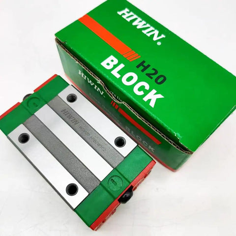 Beefy HGH20CA Linear Block Carriage With 20mm Square Linear Guide Rails next to green Hiwin H20 block packaging