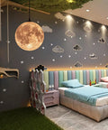 Resin Moon Pendant Lamp With Plug In Adjustable Cord 3D Printed Hanging Ceiling Light Fixture in a children's room setting