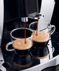 Barista-Grade Automatic Espresso Machine With 15 Bar Pressure, Built-In Grinder, making two espressos into clear cups