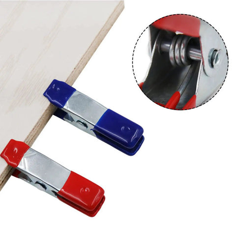 2 Inch Heavy Duty Spring Clamps For Woodworking And Photo Studio Backdrops, nickel plated metal clips in blue and red on wood edge