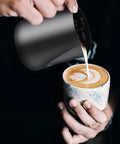 Sturdy Stainless Steel Milk Frothing Pitcher 12 Oz 350 Ml With Barista Grade Latte Art Pen for espresso machines in use