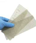 Premium 50 Pack Mesh Sanding Discs 198x70mm Dry Polishing With Hook Loop For Wood Metal Stone 320 Grit Dust Free Anti Clogging Abrasive Pad Set shown in hand with blue glove.