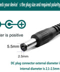 Close-up of No Fuss 24V 1A Power Supply Adapter plug with 5.5x2.5mm and 2.1mm diameters, showing polarity instructions.