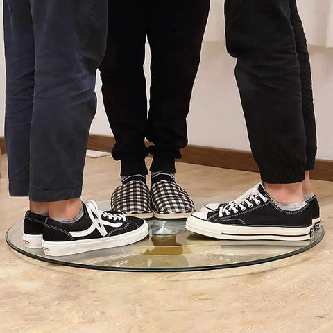 People standing on a Tempered Glass Rotating Tray Round Lazy Susan For Dining Table 39 Inch Turntable Serving Plate Durable Glass Surface