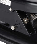 Close-up of heavy duty 4 hole paper punch showing iron construction and adjustment features for up to 30 sheets.