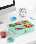 Leakproof Salad Dressing Containers To Go With Lids 6 Pack 2.7 Oz Small Sauce Jars on desk with lunch box